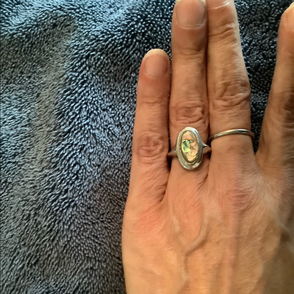 Silver and iridescent opal ring